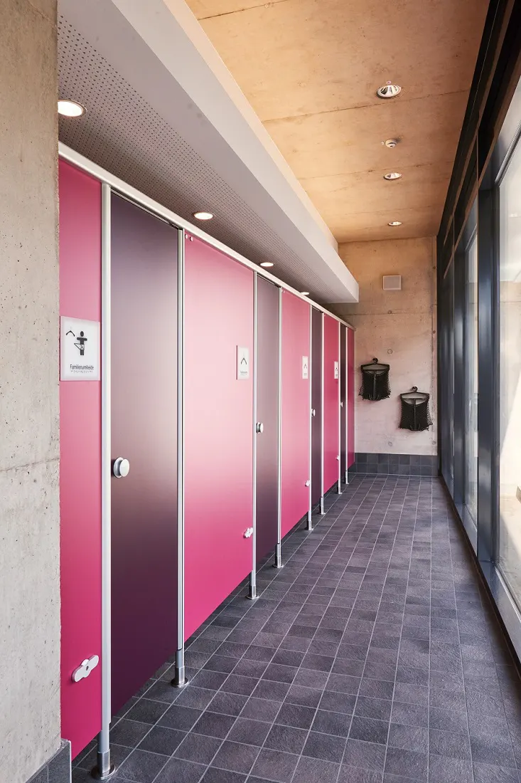 Family changing cubicles with baby change inside the cubicles